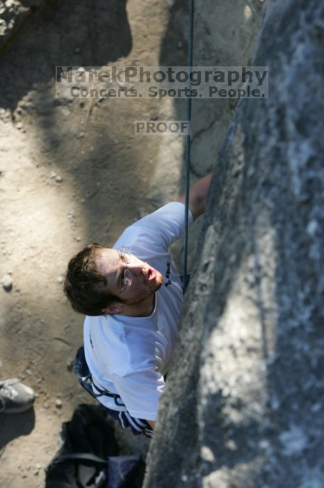 Me top roping Lick the Window (5.10c), shot by Javier Morales from the top of Ack! (5.11b, but using the crack for the start instead) that I top roped up with my camera on my back.  It was another long day of rock climbing at Seismic Wall on Austin's Barton Creek Greenbelt, Sunday, April 5, 2009.

Filename: SRM_20090405_17232205.jpg
Aperture: f/5.0
Shutter Speed: 1/320
Body: Canon EOS-1D Mark II
Lens: Canon EF 80-200mm f/2.8 L