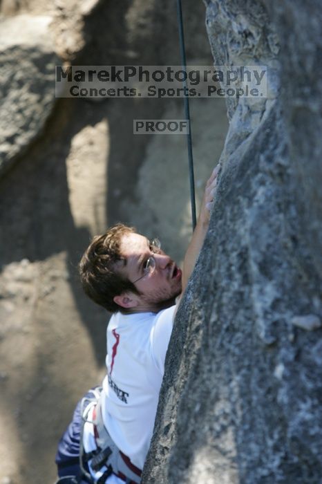 Me top roping Lick the Window (5.10c), shot by Javier Morales from the top of Ack! (5.11b, but using the crack for the start instead) that I top roped up with my camera on my back.  It was another long day of rock climbing at Seismic Wall on Austin's Barton Creek Greenbelt, Sunday, April 5, 2009.

Filename: SRM_20090405_17241122.jpg
Aperture: f/5.0
Shutter Speed: 1/320
Body: Canon EOS-1D Mark II
Lens: Canon EF 80-200mm f/2.8 L