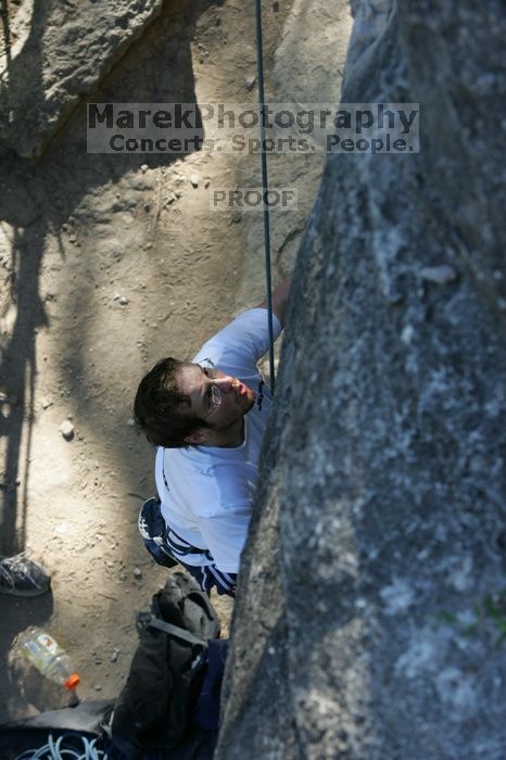 Me top roping Lick the Window (5.10c), shot by Javier Morales from the top of Ack! (5.11b, but using the crack for the start instead) that I top roped up with my camera on my back.  It was another long day of rock climbing at Seismic Wall on Austin's Barton Creek Greenbelt, Sunday, April 5, 2009.

Filename: SRM_20090405_17260629.jpg
Aperture: f/5.0
Shutter Speed: 1/320
Body: Canon EOS-1D Mark II
Lens: Canon EF 80-200mm f/2.8 L