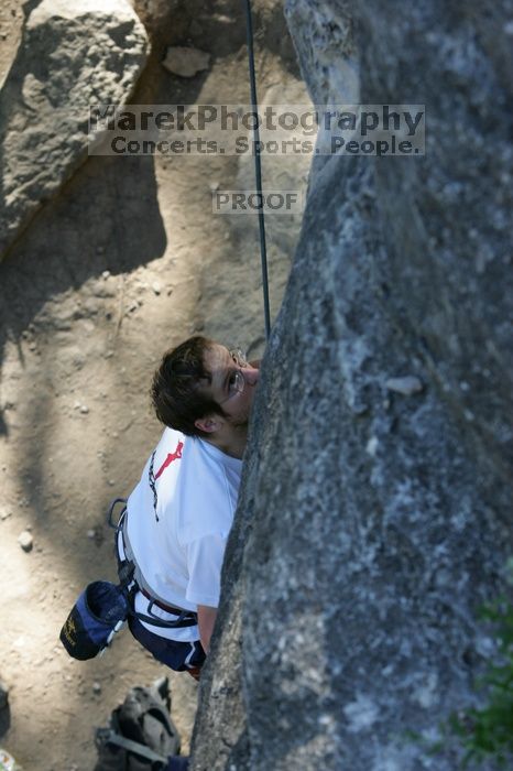 Me top roping Lick the Window (5.10c), shot by Javier Morales from the top of Ack! (5.11b, but using the crack for the start instead) that I top roped up with my camera on my back.  It was another long day of rock climbing at Seismic Wall on Austin's Barton Creek Greenbelt, Sunday, April 5, 2009.

Filename: SRM_20090405_17260730.jpg
Aperture: f/5.0
Shutter Speed: 1/320
Body: Canon EOS-1D Mark II
Lens: Canon EF 80-200mm f/2.8 L