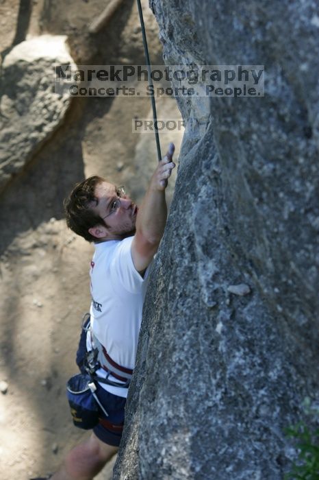 Me top roping Lick the Window (5.10c), shot by Javier Morales from the top of Ack! (5.11b, but using the crack for the start instead) that I top roped up with my camera on my back.  It was another long day of rock climbing at Seismic Wall on Austin's Barton Creek Greenbelt, Sunday, April 5, 2009.

Filename: SRM_20090405_17260732.jpg
Aperture: f/5.0
Shutter Speed: 1/320
Body: Canon EOS-1D Mark II
Lens: Canon EF 80-200mm f/2.8 L