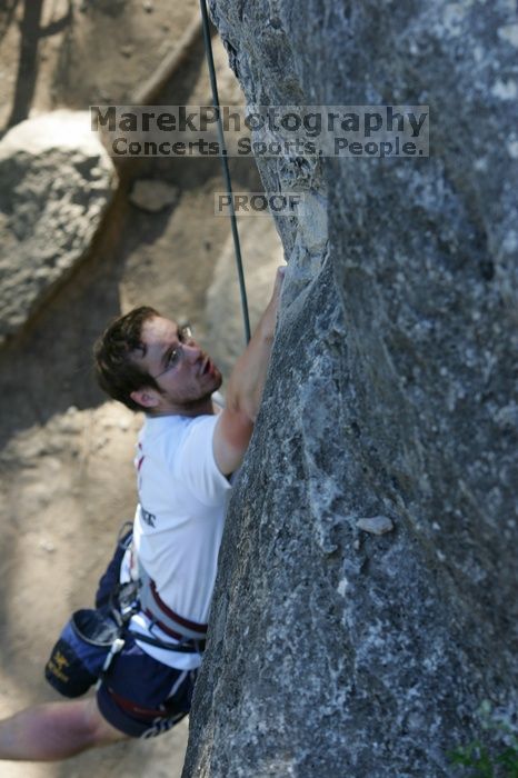 Me top roping Lick the Window (5.10c), shot by Javier Morales from the top of Ack! (5.11b, but using the crack for the start instead) that I top roped up with my camera on my back.  It was another long day of rock climbing at Seismic Wall on Austin's Barton Creek Greenbelt, Sunday, April 5, 2009.

Filename: SRM_20090405_17260733.jpg
Aperture: f/4.5
Shutter Speed: 1/320
Body: Canon EOS-1D Mark II
Lens: Canon EF 80-200mm f/2.8 L