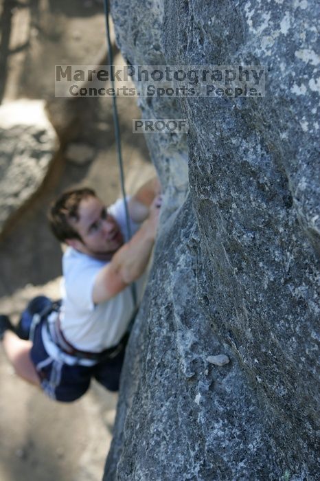 Me top roping Lick the Window (5.10c), shot by Javier Morales from the top of Ack! (5.11b, but using the crack for the start instead) that I top roped up with my camera on my back.  It was another long day of rock climbing at Seismic Wall on Austin's Barton Creek Greenbelt, Sunday, April 5, 2009.

Filename: SRM_20090405_17260836.jpg
Aperture: f/4.5
Shutter Speed: 1/320
Body: Canon EOS-1D Mark II
Lens: Canon EF 80-200mm f/2.8 L