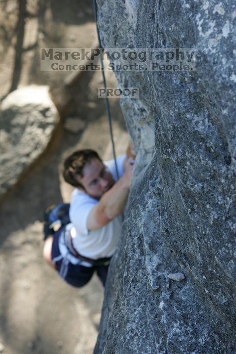 Me top roping Lick the Window (5.10c), shot by Javier Morales from the top of Ack! (5.11b, but using the crack for the start instead) that I top roped up with my camera on my back.  It was another long day of rock climbing at Seismic Wall on Austin's Barton Creek Greenbelt, Sunday, April 5, 2009.

Filename: SRM_20090405_17260837.jpg
Aperture: f/4.5
Shutter Speed: 1/320
Body: Canon EOS-1D Mark II
Lens: Canon EF 80-200mm f/2.8 L