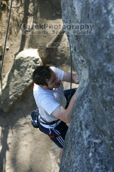 Me top roping Lick the Window (5.10c), shot by Javier Morales from the top of Ack! (5.11b, but using the crack for the start instead) that I top roped up with my camera on my back.  It was another long day of rock climbing at Seismic Wall on Austin's Barton Creek Greenbelt, Sunday, April 5, 2009.

Filename: SRM_20090405_17261146.jpg
Aperture: f/4.5
Shutter Speed: 1/320
Body: Canon EOS-1D Mark II
Lens: Canon EF 80-200mm f/2.8 L