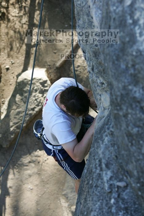 Me top roping Lick the Window (5.10c), shot by Javier Morales from the top of Ack! (5.11b, but using the crack for the start instead) that I top roped up with my camera on my back.  It was another long day of rock climbing at Seismic Wall on Austin's Barton Creek Greenbelt, Sunday, April 5, 2009.

Filename: SRM_20090405_17261247.jpg
Aperture: f/4.5
Shutter Speed: 1/320
Body: Canon EOS-1D Mark II
Lens: Canon EF 80-200mm f/2.8 L