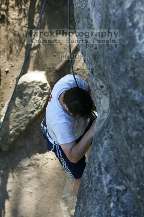 Me top roping Lick the Window (5.10c), shot by Javier Morales from the top of Ack! (5.11b, but using the crack for the start instead) that I top roped up with my camera on my back.  It was another long day of rock climbing at Seismic Wall on Austin's Barton Creek Greenbelt, Sunday, April 5, 2009.

Filename: SRM_20090405_17261248.jpg
Aperture: f/5.0
Shutter Speed: 1/320
Body: Canon EOS-1D Mark II
Lens: Canon EF 80-200mm f/2.8 L