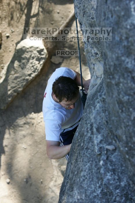 Me top roping Lick the Window (5.10c), shot by Javier Morales from the top of Ack! (5.11b, but using the crack for the start instead) that I top roped up with my camera on my back.  It was another long day of rock climbing at Seismic Wall on Austin's Barton Creek Greenbelt, Sunday, April 5, 2009.

Filename: SRM_20090405_17261954.jpg
Aperture: f/4.5
Shutter Speed: 1/320
Body: Canon EOS-1D Mark II
Lens: Canon EF 80-200mm f/2.8 L