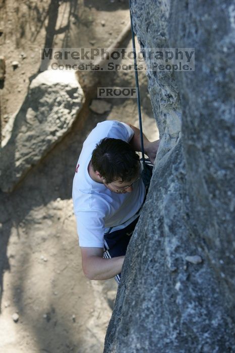 Me top roping Lick the Window (5.10c), shot by Javier Morales from the top of Ack! (5.11b, but using the crack for the start instead) that I top roped up with my camera on my back.  It was another long day of rock climbing at Seismic Wall on Austin's Barton Creek Greenbelt, Sunday, April 5, 2009.

Filename: SRM_20090405_17261955.jpg
Aperture: f/4.5
Shutter Speed: 1/320
Body: Canon EOS-1D Mark II
Lens: Canon EF 80-200mm f/2.8 L