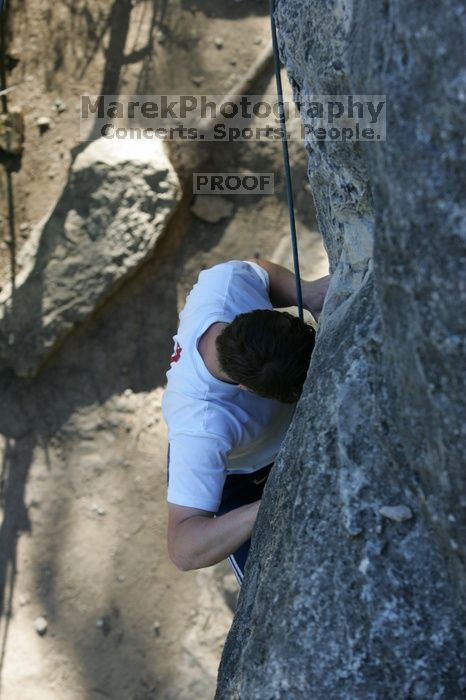 Me top roping Lick the Window (5.10c), shot by Javier Morales from the top of Ack! (5.11b, but using the crack for the start instead) that I top roped up with my camera on my back.  It was another long day of rock climbing at Seismic Wall on Austin's Barton Creek Greenbelt, Sunday, April 5, 2009.

Filename: SRM_20090405_17262056.jpg
Aperture: f/5.0
Shutter Speed: 1/320
Body: Canon EOS-1D Mark II
Lens: Canon EF 80-200mm f/2.8 L