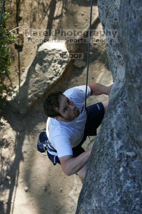 Me top roping Lick the Window (5.10c), shot by Javier Morales from the top of Ack! (5.11b, but using the crack for the start instead) that I top roped up with my camera on my back.  It was another long day of rock climbing at Seismic Wall on Austin's Barton Creek Greenbelt, Sunday, April 5, 2009.

Filename: SRM_20090405_17263062.jpg
Aperture: f/5.0
Shutter Speed: 1/320
Body: Canon EOS-1D Mark II
Lens: Canon EF 80-200mm f/2.8 L