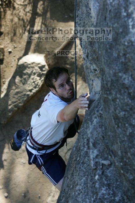 Me top roping Lick the Window (5.10c), shot by Javier Morales from the top of Ack! (5.11b, but using the crack for the start instead) that I top roped up with my camera on my back.  It was another long day of rock climbing at Seismic Wall on Austin's Barton Creek Greenbelt, Sunday, April 5, 2009.

Filename: SRM_20090405_17263064.jpg
Aperture: f/5.0
Shutter Speed: 1/320
Body: Canon EOS-1D Mark II
Lens: Canon EF 80-200mm f/2.8 L