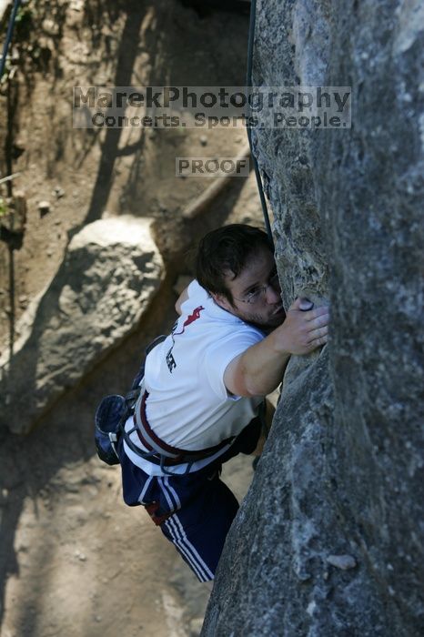 Me top roping Lick the Window (5.10c), shot by Javier Morales from the top of Ack! (5.11b, but using the crack for the start instead) that I top roped up with my camera on my back.  It was another long day of rock climbing at Seismic Wall on Austin's Barton Creek Greenbelt, Sunday, April 5, 2009.

Filename: SRM_20090405_17263171.jpg
Aperture: f/5.0
Shutter Speed: 1/320
Body: Canon EOS-1D Mark II
Lens: Canon EF 80-200mm f/2.8 L