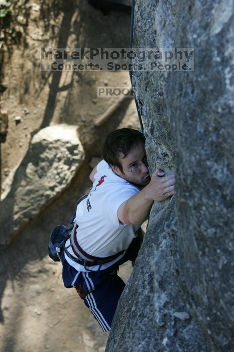 Me top roping Lick the Window (5.10c), shot by Javier Morales from the top of Ack! (5.11b, but using the crack for the start instead) that I top roped up with my camera on my back.  It was another long day of rock climbing at Seismic Wall on Austin's Barton Creek Greenbelt, Sunday, April 5, 2009.

Filename: SRM_20090405_17263272.jpg
Aperture: f/5.0
Shutter Speed: 1/320
Body: Canon EOS-1D Mark II
Lens: Canon EF 80-200mm f/2.8 L