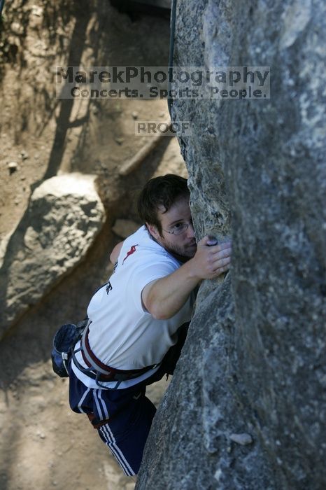 Me top roping Lick the Window (5.10c), shot by Javier Morales from the top of Ack! (5.11b, but using the crack for the start instead) that I top roped up with my camera on my back.  It was another long day of rock climbing at Seismic Wall on Austin's Barton Creek Greenbelt, Sunday, April 5, 2009.

Filename: SRM_20090405_17263274.jpg
Aperture: f/5.0
Shutter Speed: 1/320
Body: Canon EOS-1D Mark II
Lens: Canon EF 80-200mm f/2.8 L