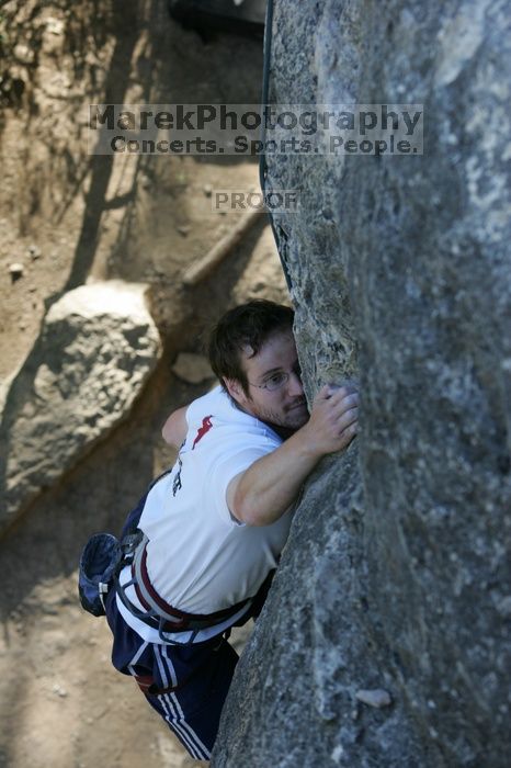 Me top roping Lick the Window (5.10c), shot by Javier Morales from the top of Ack! (5.11b, but using the crack for the start instead) that I top roped up with my camera on my back.  It was another long day of rock climbing at Seismic Wall on Austin's Barton Creek Greenbelt, Sunday, April 5, 2009.

Filename: SRM_20090405_17263275.jpg
Aperture: f/5.0
Shutter Speed: 1/320
Body: Canon EOS-1D Mark II
Lens: Canon EF 80-200mm f/2.8 L