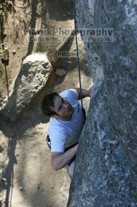 Me top roping Lick the Window (5.10c), shot by Javier Morales from the top of Ack! (5.11b, but using the crack for the start instead) that I top roped up with my camera on my back.  It was another long day of rock climbing at Seismic Wall on Austin's Barton Creek Greenbelt, Sunday, April 5, 2009.

Filename: SRM_20090405_17264777.jpg
Aperture: f/5.0
Shutter Speed: 1/320
Body: Canon EOS-1D Mark II
Lens: Canon EF 80-200mm f/2.8 L