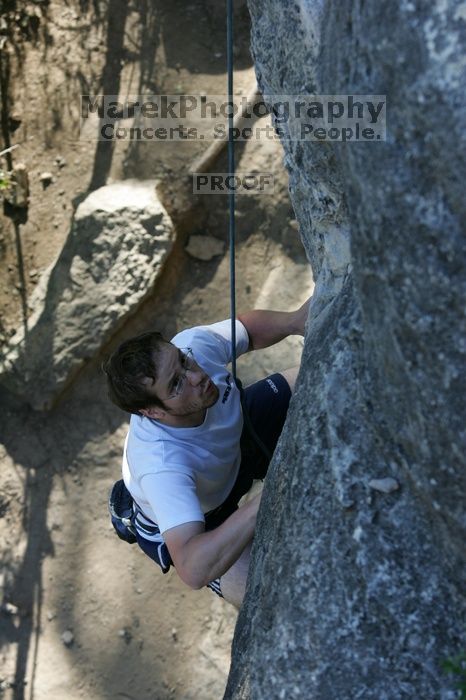 Me top roping Lick the Window (5.10c), shot by Javier Morales from the top of Ack! (5.11b, but using the crack for the start instead) that I top roped up with my camera on my back.  It was another long day of rock climbing at Seismic Wall on Austin's Barton Creek Greenbelt, Sunday, April 5, 2009.

Filename: SRM_20090405_17264879.jpg
Aperture: f/5.0
Shutter Speed: 1/320
Body: Canon EOS-1D Mark II
Lens: Canon EF 80-200mm f/2.8 L