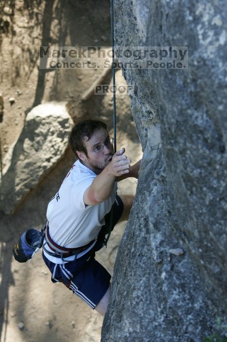 Me top roping Lick the Window (5.10c), shot by Javier Morales from the top of Ack! (5.11b, but using the crack for the start instead) that I top roped up with my camera on my back.  It was another long day of rock climbing at Seismic Wall on Austin's Barton Creek Greenbelt, Sunday, April 5, 2009.

Filename: SRM_20090405_17264980.jpg
Aperture: f/4.5
Shutter Speed: 1/320
Body: Canon EOS-1D Mark II
Lens: Canon EF 80-200mm f/2.8 L