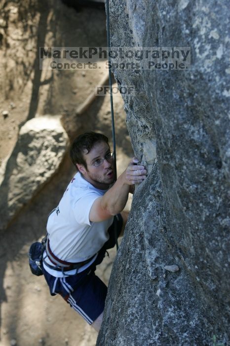 Me top roping Lick the Window (5.10c), shot by Javier Morales from the top of Ack! (5.11b, but using the crack for the start instead) that I top roped up with my camera on my back.  It was another long day of rock climbing at Seismic Wall on Austin's Barton Creek Greenbelt, Sunday, April 5, 2009.

Filename: SRM_20090405_17264982.jpg
Aperture: f/5.0
Shutter Speed: 1/320
Body: Canon EOS-1D Mark II
Lens: Canon EF 80-200mm f/2.8 L