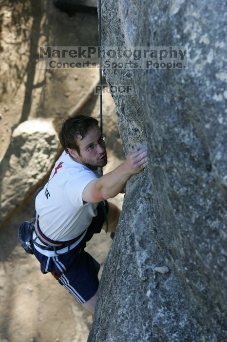 Me top roping Lick the Window (5.10c), shot by Javier Morales from the top of Ack! (5.11b, but using the crack for the start instead) that I top roped up with my camera on my back.  It was another long day of rock climbing at Seismic Wall on Austin's Barton Creek Greenbelt, Sunday, April 5, 2009.

Filename: SRM_20090405_17264984.jpg
Aperture: f/4.5
Shutter Speed: 1/320
Body: Canon EOS-1D Mark II
Lens: Canon EF 80-200mm f/2.8 L