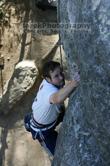 Me top roping Lick the Window (5.10c), shot by Javier Morales from the top of Ack! (5.11b, but using the crack for the start instead) that I top roped up with my camera on my back.  It was another long day of rock climbing at Seismic Wall on Austin's Barton Creek Greenbelt, Sunday, April 5, 2009.

Filename: SRM_20090405_17265086.jpg
Aperture: f/4.5
Shutter Speed: 1/320
Body: Canon EOS-1D Mark II
Lens: Canon EF 80-200mm f/2.8 L