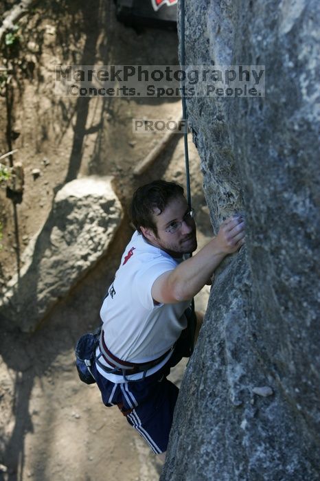 Me top roping Lick the Window (5.10c), shot by Javier Morales from the top of Ack! (5.11b, but using the crack for the start instead) that I top roped up with my camera on my back.  It was another long day of rock climbing at Seismic Wall on Austin's Barton Creek Greenbelt, Sunday, April 5, 2009.

Filename: SRM_20090405_17265187.jpg
Aperture: f/5.0
Shutter Speed: 1/320
Body: Canon EOS-1D Mark II
Lens: Canon EF 80-200mm f/2.8 L