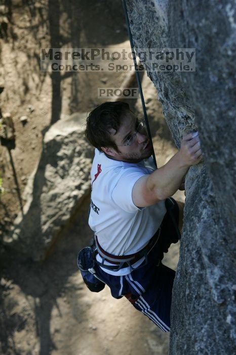 Me top roping Lick the Window (5.10c), shot by Javier Morales from the top of Ack! (5.11b, but using the crack for the start instead) that I top roped up with my camera on my back.  It was another long day of rock climbing at Seismic Wall on Austin's Barton Creek Greenbelt, Sunday, April 5, 2009.

Filename: SRM_20090405_17275092.jpg
Aperture: f/5.6
Shutter Speed: 1/320
Body: Canon EOS-1D Mark II
Lens: Canon EF 80-200mm f/2.8 L