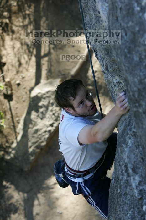 Me top roping Lick the Window (5.10c), shot by Javier Morales from the top of Ack! (5.11b, but using the crack for the start instead) that I top roped up with my camera on my back.  It was another long day of rock climbing at Seismic Wall on Austin's Barton Creek Greenbelt, Sunday, April 5, 2009.

Filename: SRM_20090405_17275193.jpg
Aperture: f/4.5
Shutter Speed: 1/320
Body: Canon EOS-1D Mark II
Lens: Canon EF 80-200mm f/2.8 L