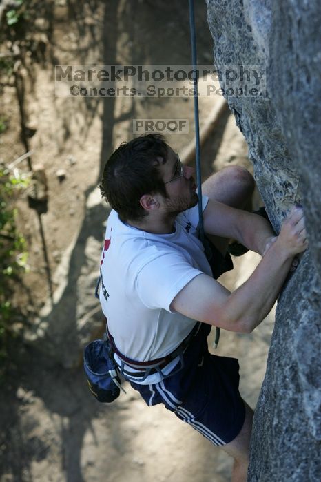 Me top roping Lick the Window (5.10c), shot by Javier Morales from the top of Ack! (5.11b, but using the crack for the start instead) that I top roped up with my camera on my back.  It was another long day of rock climbing at Seismic Wall on Austin's Barton Creek Greenbelt, Sunday, April 5, 2009.

Filename: SRM_20090405_17275502.jpg
Aperture: f/5.0
Shutter Speed: 1/320
Body: Canon EOS-1D Mark II
Lens: Canon EF 80-200mm f/2.8 L