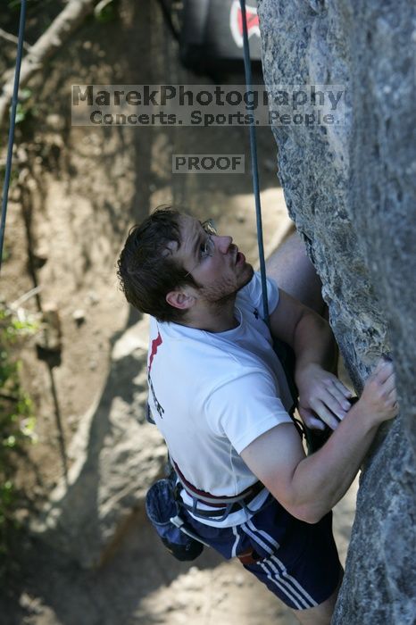 Me top roping Lick the Window (5.10c), shot by Javier Morales from the top of Ack! (5.11b, but using the crack for the start instead) that I top roped up with my camera on my back.  It was another long day of rock climbing at Seismic Wall on Austin's Barton Creek Greenbelt, Sunday, April 5, 2009.

Filename: SRM_20090405_17275604.jpg
Aperture: f/4.5
Shutter Speed: 1/320
Body: Canon EOS-1D Mark II
Lens: Canon EF 80-200mm f/2.8 L