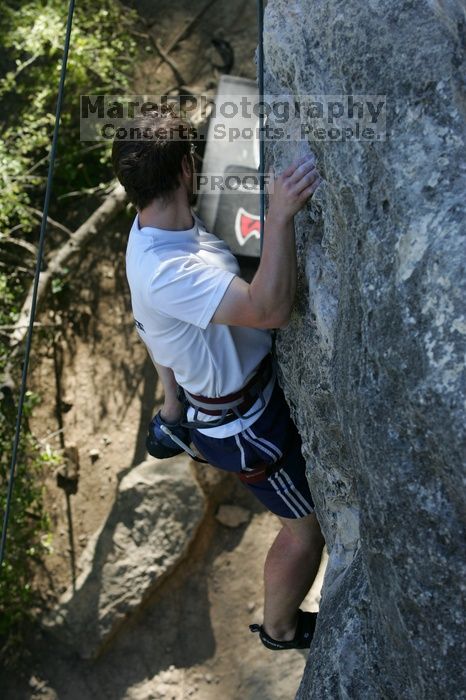 Me top roping Lick the Window (5.10c), shot by Javier Morales from the top of Ack! (5.11b, but using the crack for the start instead) that I top roped up with my camera on my back.  It was another long day of rock climbing at Seismic Wall on Austin's Barton Creek Greenbelt, Sunday, April 5, 2009.

Filename: SRM_20090405_17281524.jpg
Aperture: f/5.0
Shutter Speed: 1/320
Body: Canon EOS-1D Mark II
Lens: Canon EF 80-200mm f/2.8 L