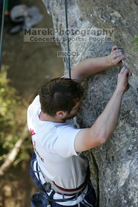 Me top roping Lick the Window (5.10c), shot by Javier Morales from the top of Ack! (5.11b, but using the crack for the start instead) that I top roped up with my camera on my back.  It was another long day of rock climbing at Seismic Wall on Austin's Barton Creek Greenbelt, Sunday, April 5, 2009.

Filename: SRM_20090405_17283731.jpg
Aperture: f/4.0
Shutter Speed: 1/320
Body: Canon EOS-1D Mark II
Lens: Canon EF 80-200mm f/2.8 L