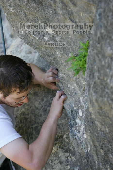 Me top roping Lick the Window (5.10c), shot by Javier Morales from the top of Ack! (5.11b, but using the crack for the start instead) that I top roped up with my camera on my back.  It was another long day of rock climbing at Seismic Wall on Austin's Barton Creek Greenbelt, Sunday, April 5, 2009.

Filename: SRM_20090405_17284235.jpg
Aperture: f/3.5
Shutter Speed: 1/320
Body: Canon EOS-1D Mark II
Lens: Canon EF 80-200mm f/2.8 L