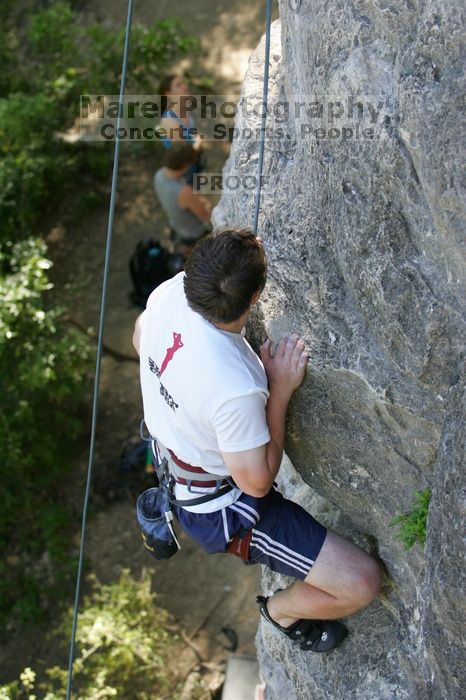 Me top roping Lick the Window (5.10c), shot by Javier Morales from the top of Ack! (5.11b, but using the crack for the start instead) that I top roped up with my camera on my back.  It was another long day of rock climbing at Seismic Wall on Austin's Barton Creek Greenbelt, Sunday, April 5, 2009.

Filename: SRM_20090405_17285142.jpg
Aperture: f/4.0
Shutter Speed: 1/320
Body: Canon EOS-1D Mark II
Lens: Canon EF 80-200mm f/2.8 L