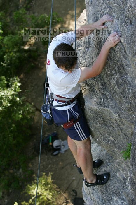 Me top roping Lick the Window (5.10c), shot by Javier Morales from the top of Ack! (5.11b, but using the crack for the start instead) that I top roped up with my camera on my back.  It was another long day of rock climbing at Seismic Wall on Austin's Barton Creek Greenbelt, Sunday, April 5, 2009.

Filename: SRM_20090405_17285946.jpg
Aperture: f/4.0
Shutter Speed: 1/320
Body: Canon EOS-1D Mark II
Lens: Canon EF 80-200mm f/2.8 L