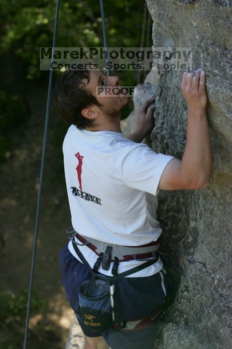 Me top roping Lick the Window (5.10c), shot by Javier Morales from the top of Ack! (5.11b, but using the crack for the start instead) that I top roped up with my camera on my back.  It was another long day of rock climbing at Seismic Wall on Austin's Barton Creek Greenbelt, Sunday, April 5, 2009.

Filename: SRM_20090405_17291556.jpg
Aperture: f/5.6
Shutter Speed: 1/320
Body: Canon EOS-1D Mark II
Lens: Canon EF 80-200mm f/2.8 L