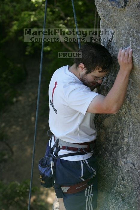 Me top roping Lick the Window (5.10c), shot by Javier Morales from the top of Ack! (5.11b, but using the crack for the start instead) that I top roped up with my camera on my back.  It was another long day of rock climbing at Seismic Wall on Austin's Barton Creek Greenbelt, Sunday, April 5, 2009.

Filename: SRM_20090405_17291660.jpg
Aperture: f/5.6
Shutter Speed: 1/320
Body: Canon EOS-1D Mark II
Lens: Canon EF 80-200mm f/2.8 L