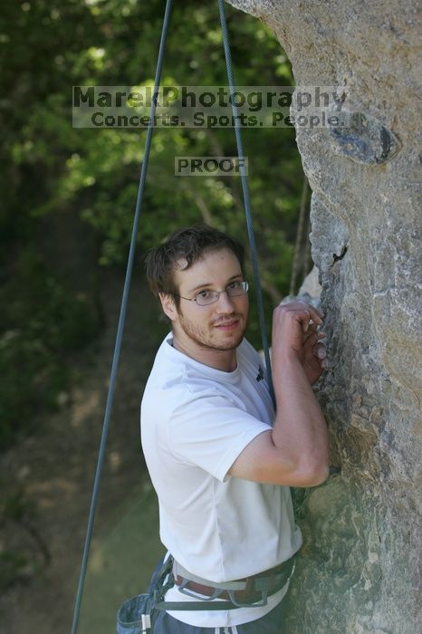 Me top roping Lick the Window (5.10c), shot by Javier Morales from the top of Ack! (5.11b, but using the crack for the start instead) that I top roped up with my camera on my back.  It was another long day of rock climbing at Seismic Wall on Austin's Barton Creek Greenbelt, Sunday, April 5, 2009.

Filename: SRM_20090405_17293662.jpg
Aperture: f/5.0
Shutter Speed: 1/320
Body: Canon EOS-1D Mark II
Lens: Canon EF 80-200mm f/2.8 L