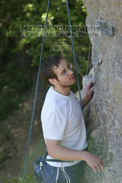 Me top roping Lick the Window (5.10c), shot by Javier Morales from the top of Ack! (5.11b, but using the crack for the start instead) that I top roped up with my camera on my back.  It was another long day of rock climbing at Seismic Wall on Austin's Barton Creek Greenbelt, Sunday, April 5, 2009.

Filename: SRM_20090405_17293863.jpg
Aperture: f/4.5
Shutter Speed: 1/320
Body: Canon EOS-1D Mark II
Lens: Canon EF 80-200mm f/2.8 L