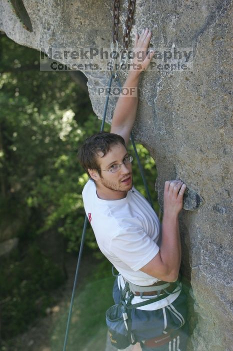 Me top roping Lick the Window (5.10c), shot by Javier Morales from the top of Ack! (5.11b, but using the crack for the start instead) that I top roped up with my camera on my back.  It was another long day of rock climbing at Seismic Wall on Austin's Barton Creek Greenbelt, Sunday, April 5, 2009.

Filename: SRM_20090405_17295070.jpg
Aperture: f/5.0
Shutter Speed: 1/320
Body: Canon EOS-1D Mark II
Lens: Canon EF 80-200mm f/2.8 L