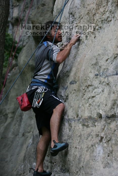 Javier Morales leading up Angel of Poets (5.10a).  It was another long day of rock climbing at Seismic Wall on Austin's Barton Creek Greenbelt, Saturday, April 11, 2009.

Filename: SRM_20090411_12352404.JPG
Aperture: f/4.5
Shutter Speed: 1/250
Body: Canon EOS-1D Mark II
Lens: Canon EF 80-200mm f/2.8 L