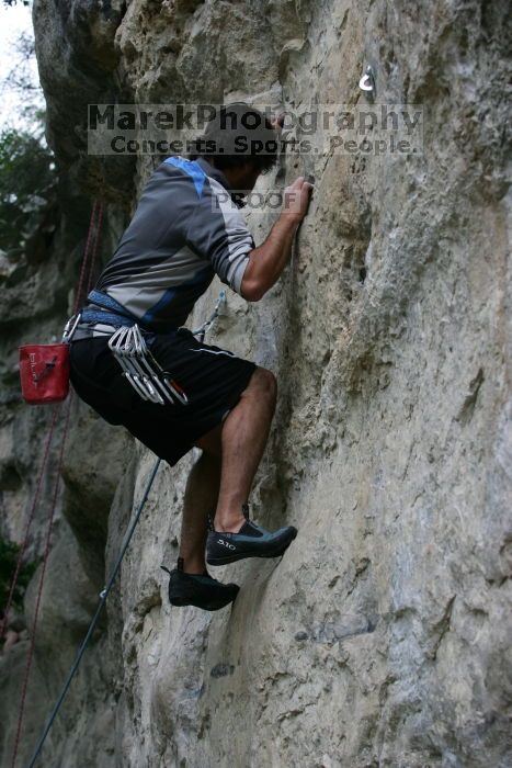 Javier Morales leading up Angel of Poets (5.10a).  It was another long day of rock climbing at Seismic Wall on Austin's Barton Creek Greenbelt, Saturday, April 11, 2009.

Filename: SRM_20090411_12363410.JPG
Aperture: f/5.6
Shutter Speed: 1/250
Body: Canon EOS-1D Mark II
Lens: Canon EF 80-200mm f/2.8 L