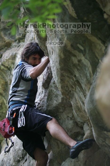 Javier Morales lead climbing Nose Print on the Windshield (5.11c).  It was another long day of rock climbing at Seismic Wall on Austin's Barton Creek Greenbelt, Saturday, April 11, 2009.

Filename: SRM_20090411_13231147.JPG
Aperture: f/2.8
Shutter Speed: 1/250
Body: Canon EOS-1D Mark II
Lens: Canon EF 80-200mm f/2.8 L