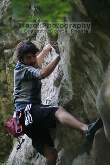 Javier Morales lead climbing Nose Print on the Windshield (5.11c).  It was another long day of rock climbing at Seismic Wall on Austin's Barton Creek Greenbelt, Saturday, April 11, 2009.

Filename: SRM_20090411_13231249.JPG
Aperture: f/2.8
Shutter Speed: 1/320
Body: Canon EOS-1D Mark II
Lens: Canon EF 80-200mm f/2.8 L