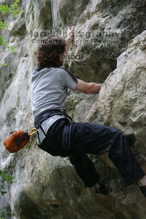 Andrew Dreher top rope climbing Nose Print on the Windshield (5.11c).  It was another long day of rock climbing at Seismic Wall on Austin's Barton Creek Greenbelt, Saturday, April 11, 2009.

Filename: SRM_20090411_14380865.JPG
Aperture: f/2.8
Shutter Speed: 1/400
Body: Canon EOS-1D Mark II
Lens: Canon EF 80-200mm f/2.8 L