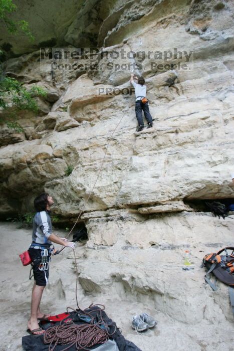 Andrew Dreher lead climbing Magster (5.10a) with Javier Morales belaying.  It was another long day of rock climbing at Seismic Wall on Austin's Barton Creek Greenbelt, Saturday, April 11, 2009.

Filename: SRM_20090411_15294680.JPG
Aperture: f/4.5
Shutter Speed: 1/250
Body: Canon EOS-1D Mark II
Lens: Canon EF 16-35mm f/2.8 L