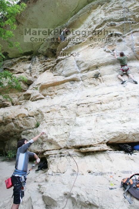 Andrew Dreher lead climbing Magster (5.10a) with Javier Morales belaying.  It was another long day of rock climbing at Seismic Wall on Austin's Barton Creek Greenbelt, Saturday, April 11, 2009.

Filename: SRM_20090411_15332792.JPG
Aperture: f/5.6
Shutter Speed: 1/100
Body: Canon EOS-1D Mark II
Lens: Canon EF 16-35mm f/2.8 L