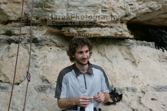 Andrew Dreher.  It was another long day of rock climbing at Seismic Wall on Austin's Barton Creek Greenbelt, Saturday, April 11, 2009.

Filename: SRM_20090411_15380899.JPG
Aperture: f/10.0
Shutter Speed: 1/100
Body: Canon EOS-1D Mark II
Lens: Canon EF 16-35mm f/2.8 L