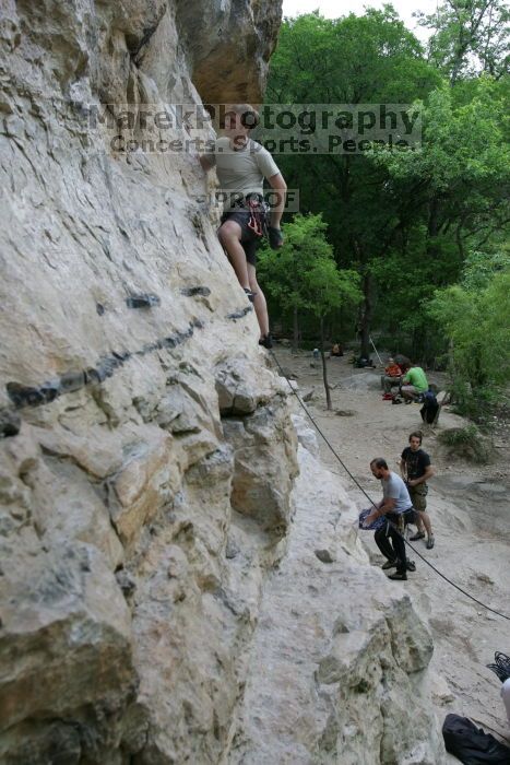 Adam Libson climbing Diving for Rocks (5.10d), shot by Andrew Dreher.  It was another long day of rock climbing at Seismic Wall on Austin's Barton Creek Greenbelt, Saturday, April 11, 2009.

Filename: SRM_20090411_15555225.JPG
Aperture: f/5.6
Shutter Speed: 1/200
Body: Canon EOS-1D Mark II
Lens: Canon EF 16-35mm f/2.8 L